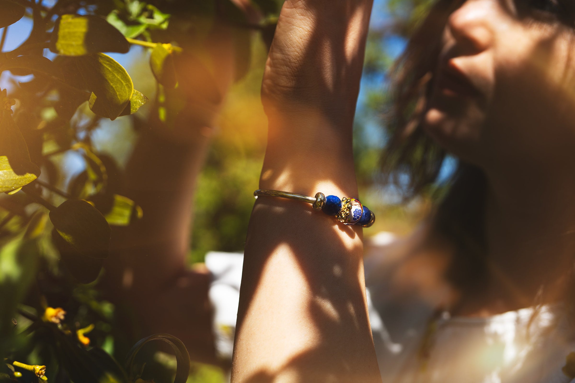 Model wearing bangle with beads